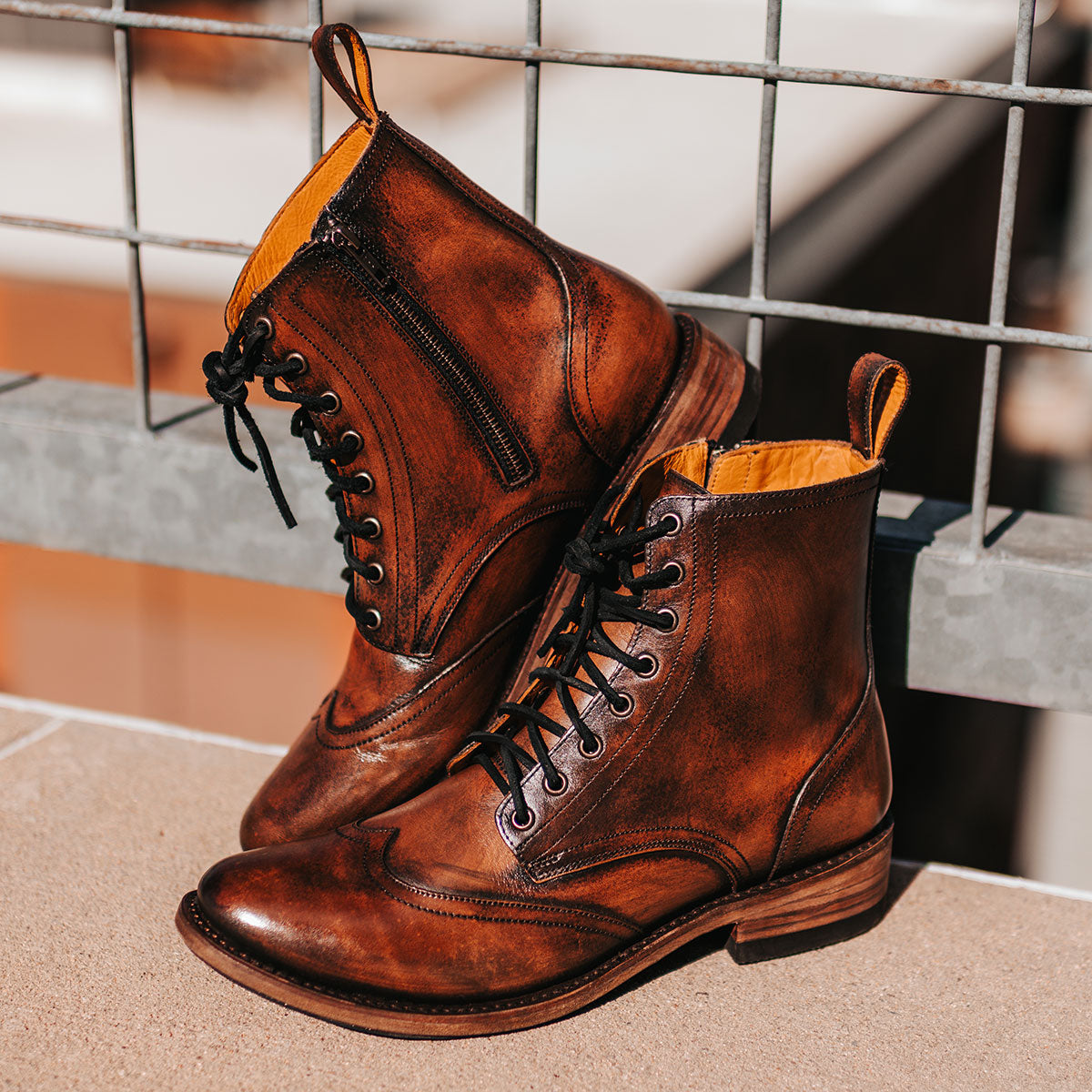 FREEBIRD men's Bodie black distressed leather boot with a full-grain leather body, a Goodyear welt, and functional leather front lacing ties 