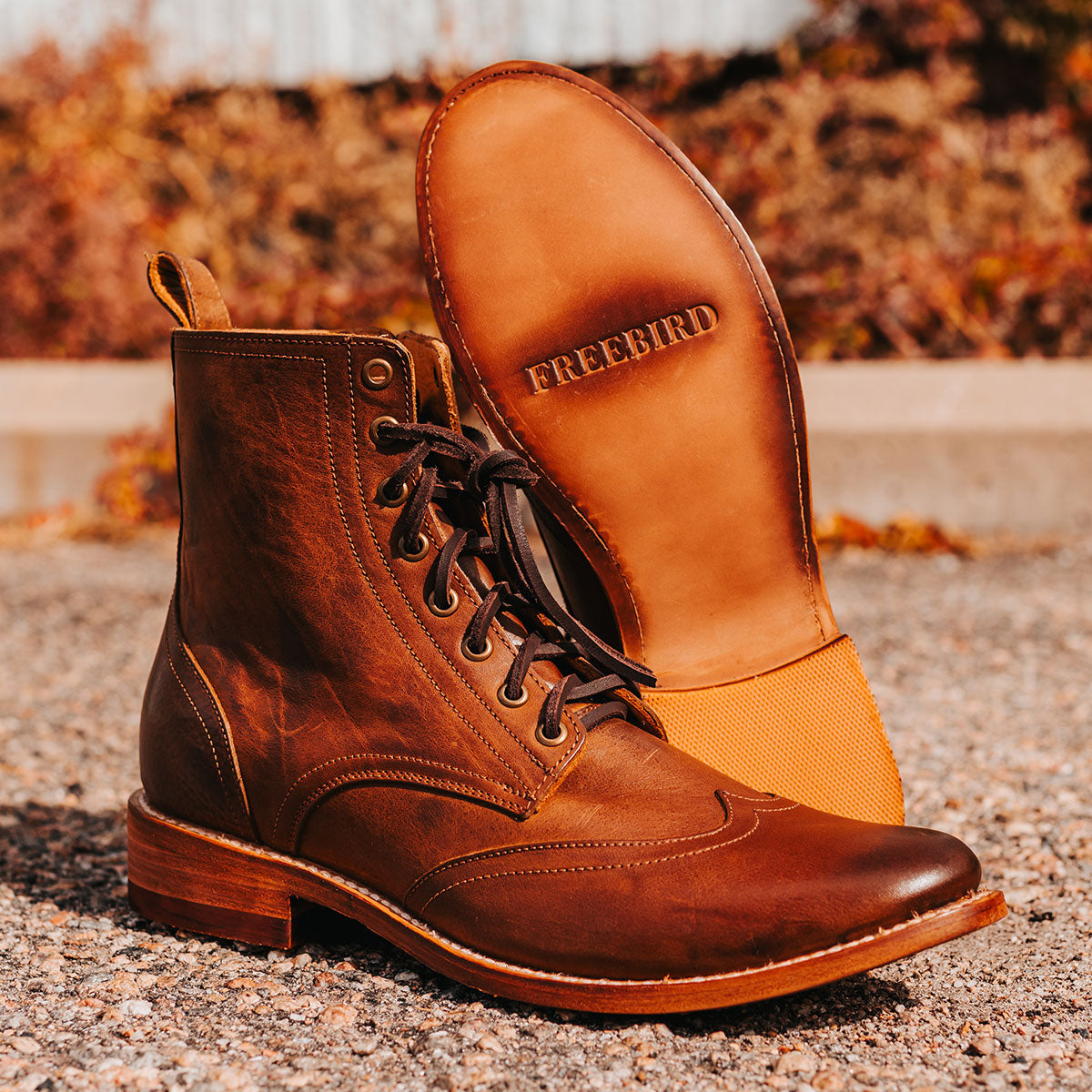 FREEBIRD men's Bodie brown leather boot with a full-grain leather body, a Goodyear welt, and functional leather front lacing ties