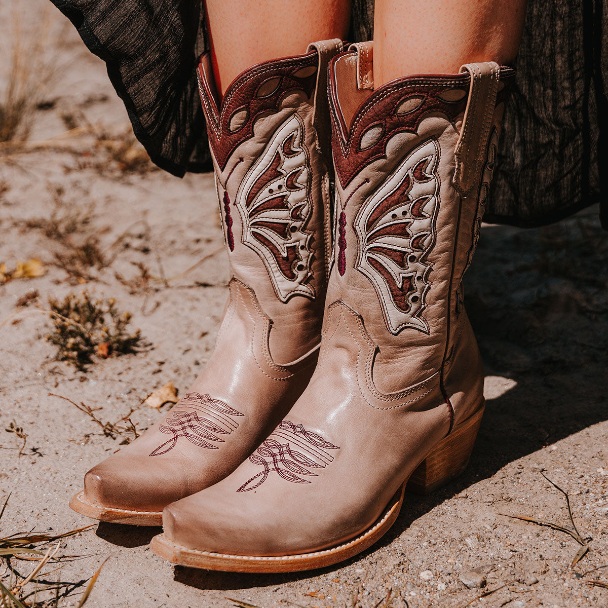 FREEBIRD women's Butterfly blush multi leather boot with laser cut detailing, a slant heel and snip toe construction