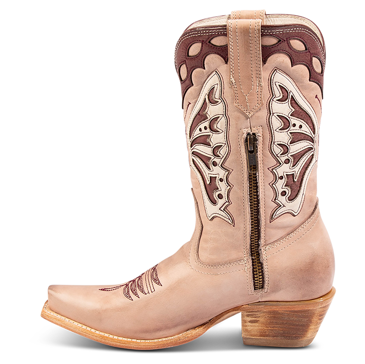 Inside view showing FREEBIRD women's Butterfly blush multi leather boot with a slant heel, inside working brass zipper and laser cut detailing