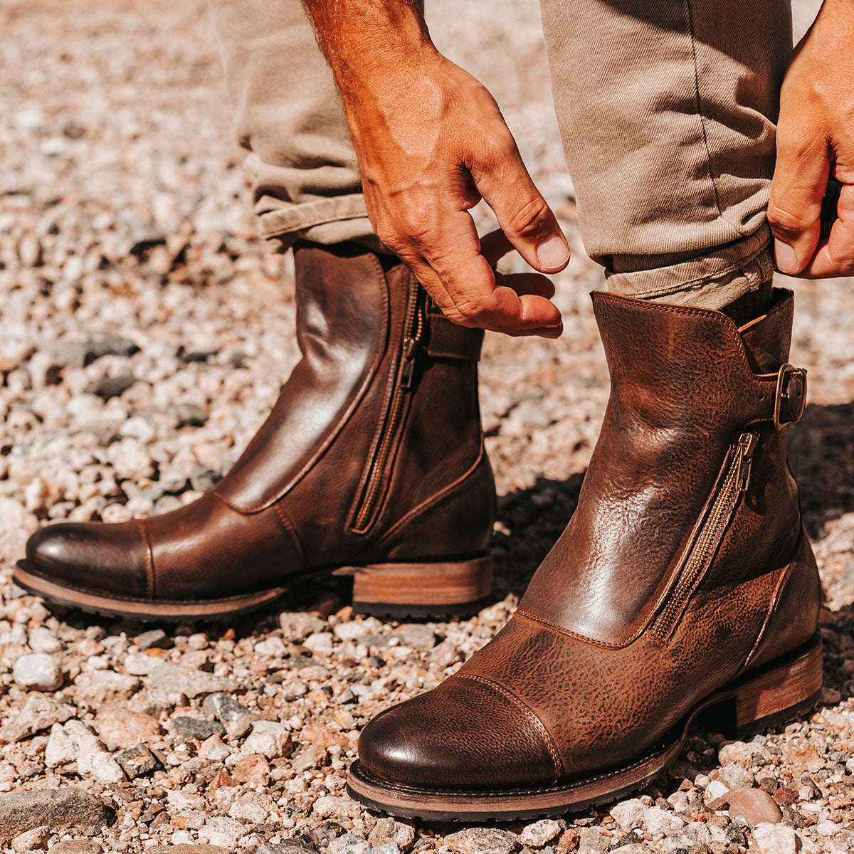 FREEBIRD men's Chayse brown leather boot featuring double zip closures, a low heel and adjustable rear buckle