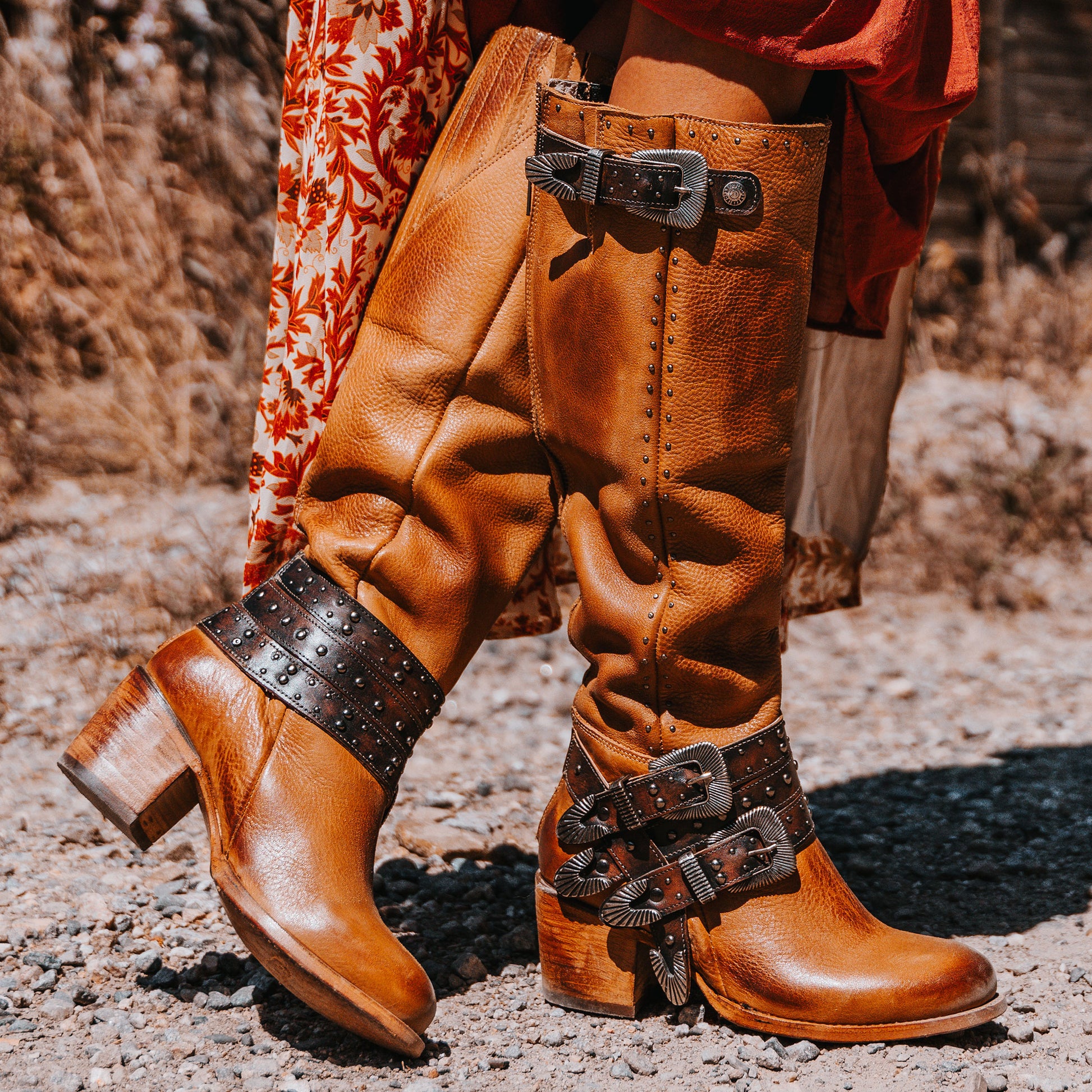 FREEBIRD women's Cleo tan leather tall boot with decorate belts, embossed studs and gore detailing