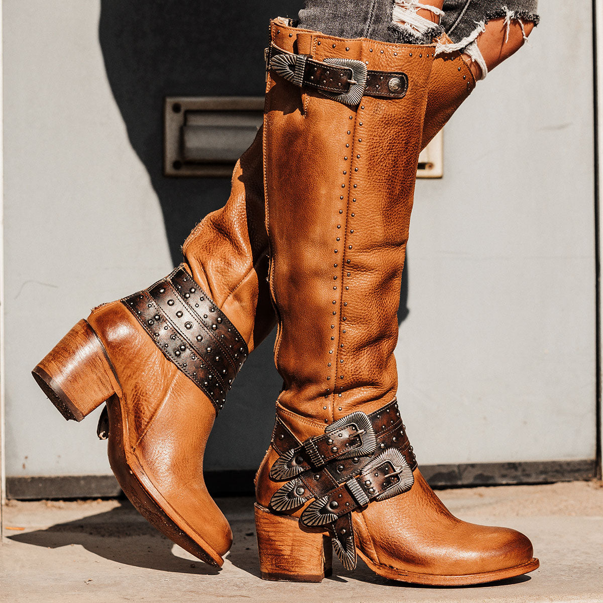 FREEBIRD women's Cleo tan leather tall boot with decorate belts, embossed studs and gore detailing