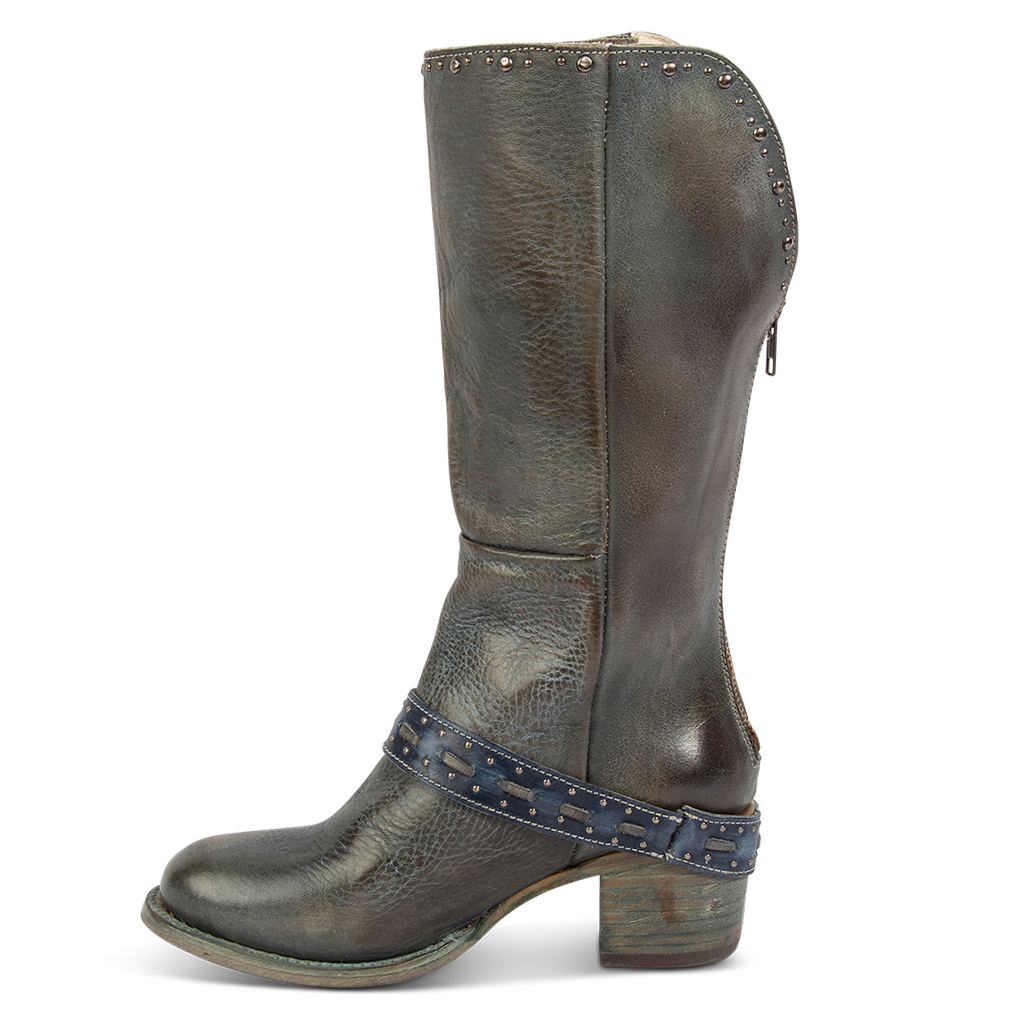 Inside view showing FREEBIRD women's Contour blue leather boot with embossed studs, working back zipper and block heel