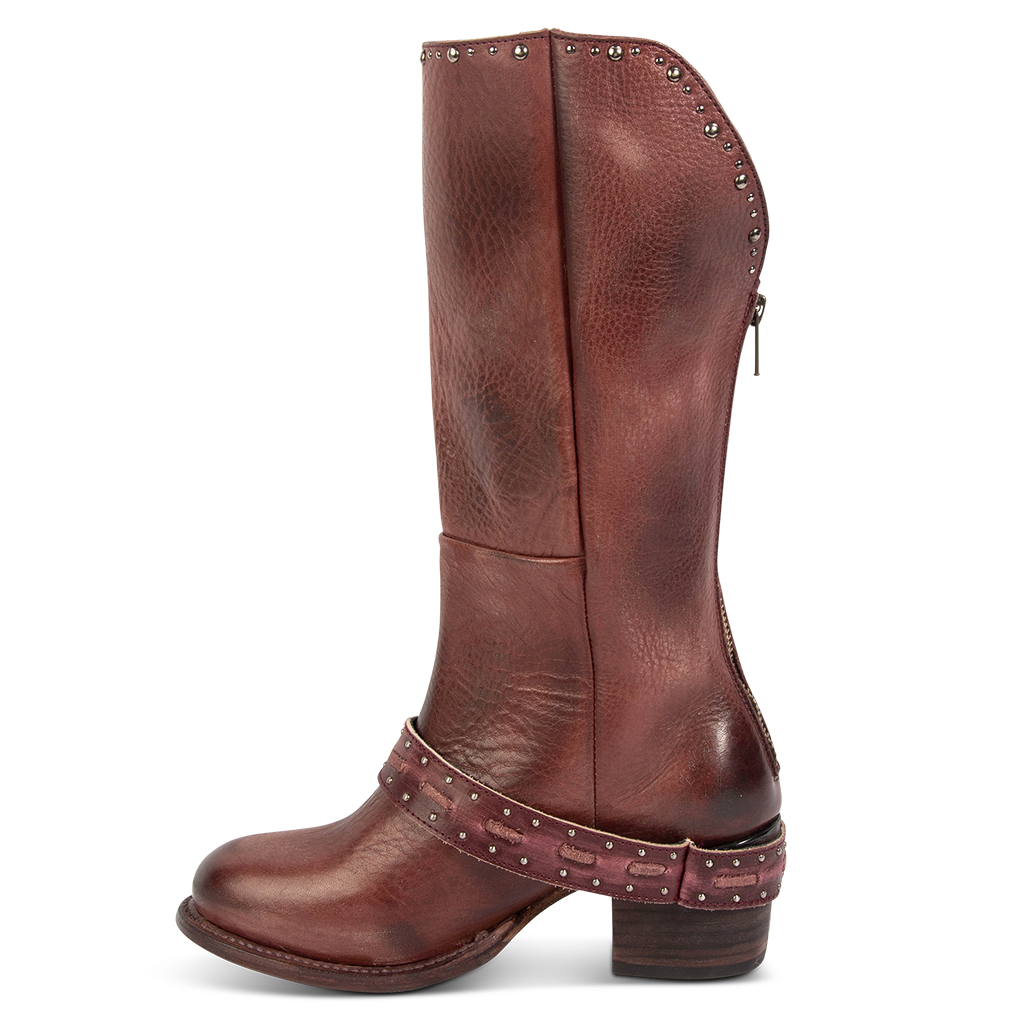 Inside view showing FREEBIRD women's Contour wine leather boot with embossed studs, working back zipper and block heel