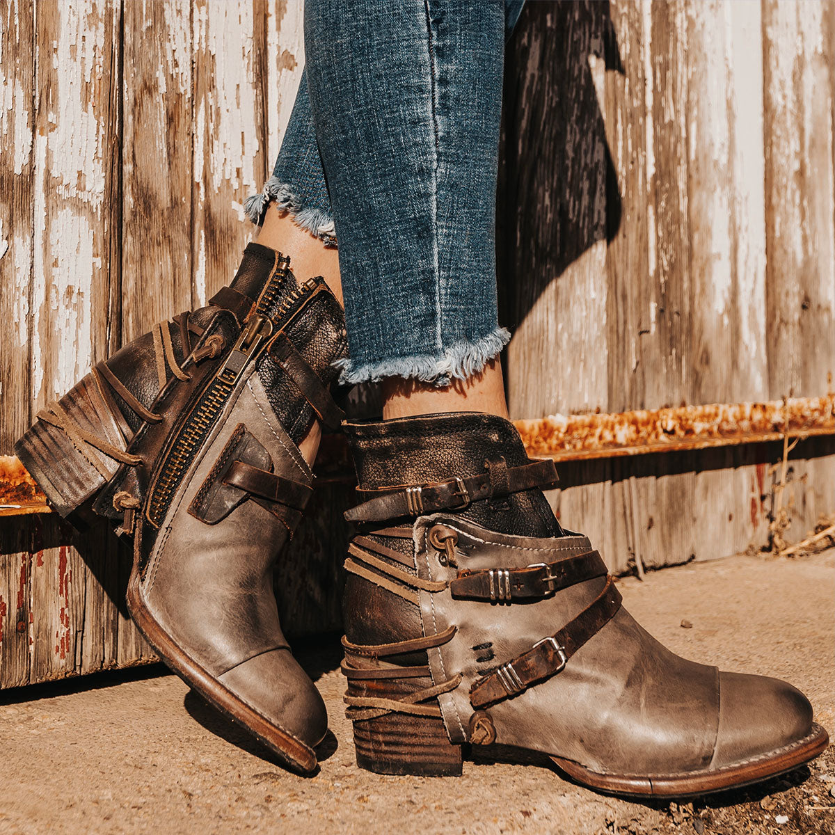 FREEBIRD women's Crue grey multi leather cutout ankle bootie with silver hardware straps and back lacing detail 