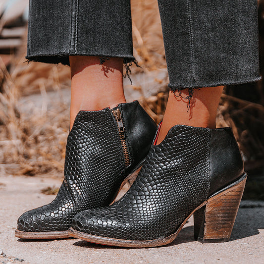 FREEBIRD women's Detroit black snake featuring inverted heel, front cut out dip, and two toned full grain leather