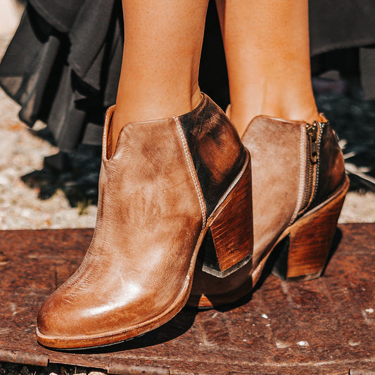 FREEBIRD women's Detroit taupe featuring inverted heel, front cut out dip, and two toned full grain leather