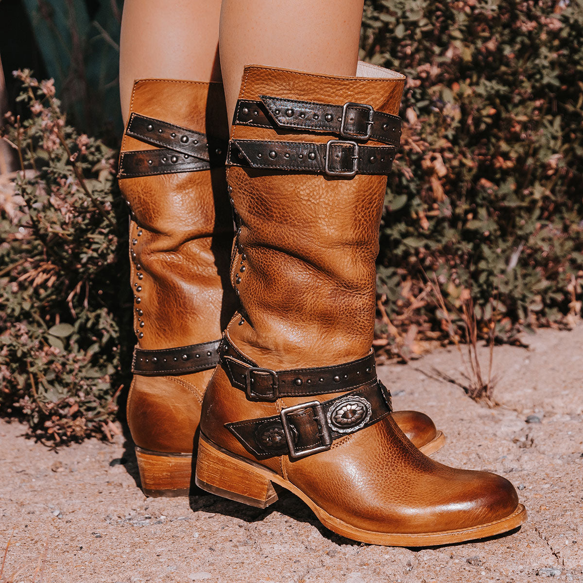 FREEBIRD women's Garrison tan leather boot with adjustable shaft belts, concho belts and low heel lifestyle