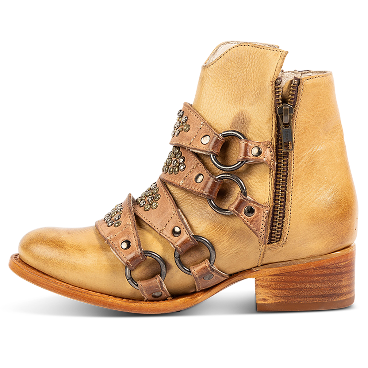 Inside view showing FREEBIRD women's Grady beige leather bootie with an inside working zipper, low bock heel and abstract shaft belt detailing