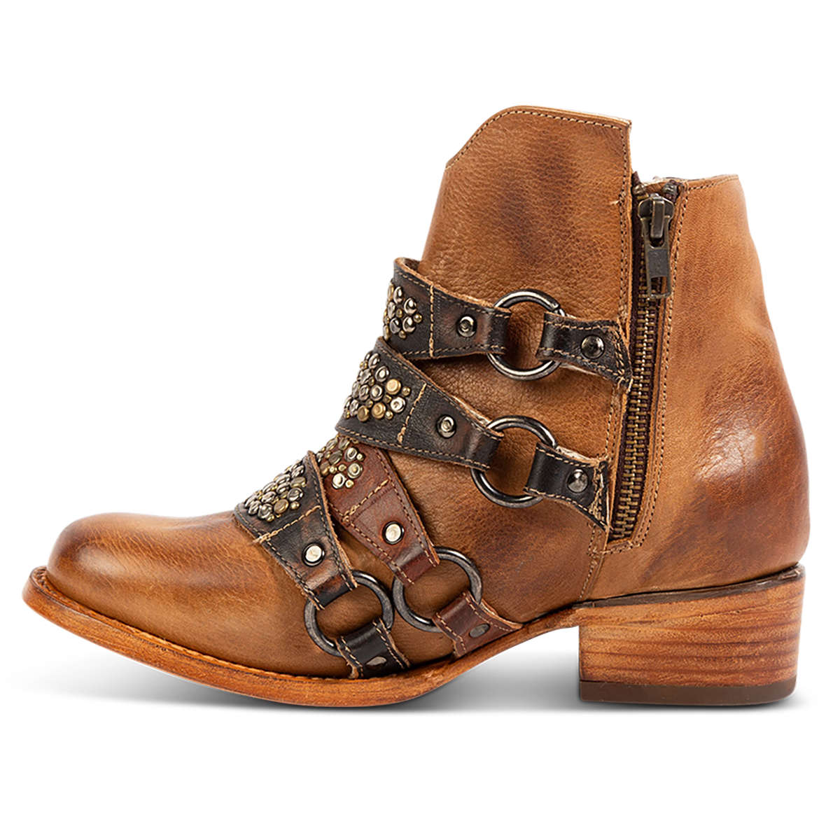 Inside view showing FREEBIRD women's Grady tan leather bootie with an inside working zipper, low bock heel and abstract shaft belt detailing