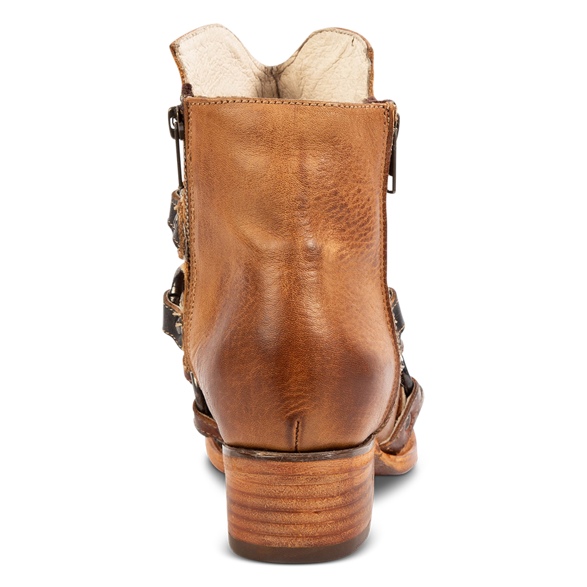 Back view showing a low block heel and inside working zipper on FREEBIRD women's Grady tan leather bootie