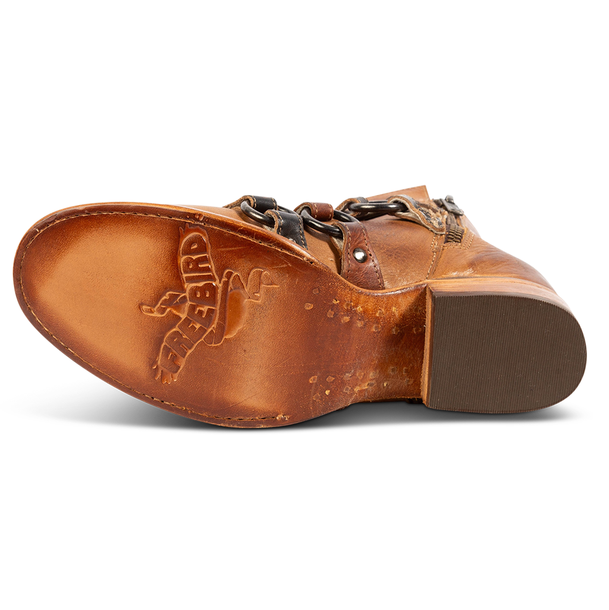 Leather sole imprinted with FREEBIRD on women's Grady tan leather bootie