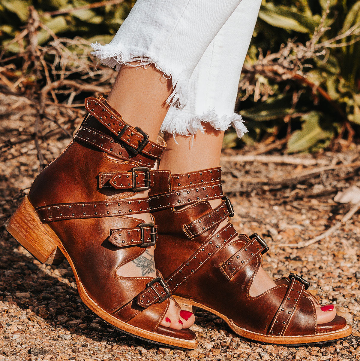 FREEBIRD women's Gunnar cognac leather sandal with adjustable leather straps, studded embellishments and a low block heel