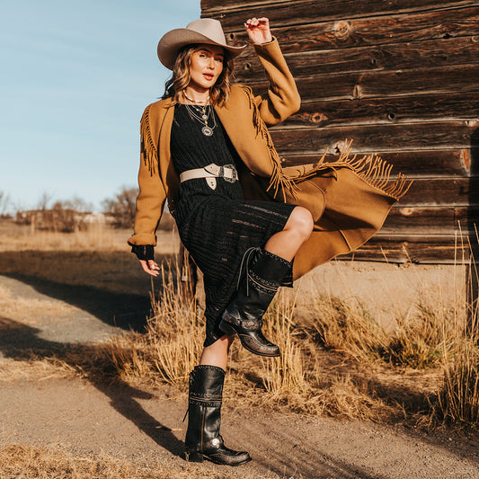 FREEBIRD women's Gynger black leather boot with a harness belt, stud embellishments and signature stitching lifestyle