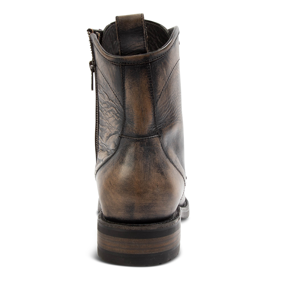 Back view showing a leather pull strap and elevated heel on FREEBIRD men's Idaho steel leather boot