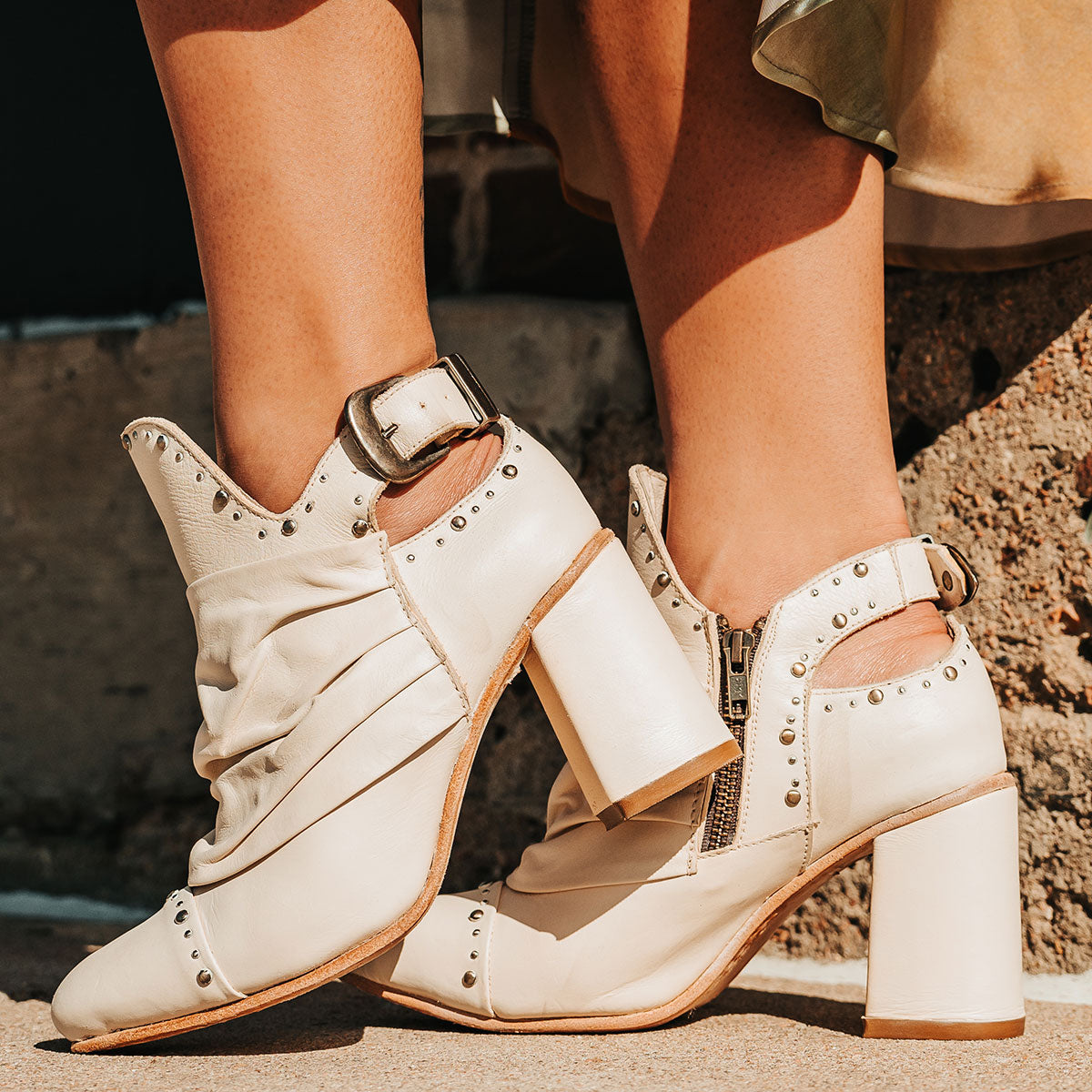 FREEBIRD women's Jericho beige leather bootie with a leather overlay, studded embellishments and inside working brass zipper