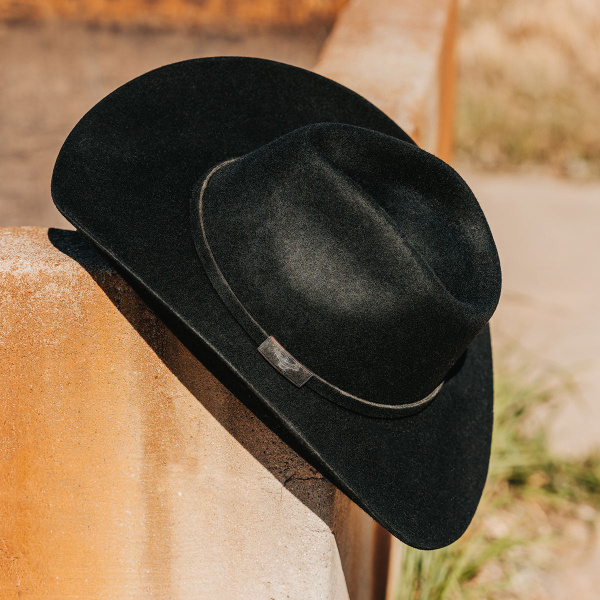 FREEBIRD women's Kolten black wool hat with a curved brim, front pinch crown and silk bandana interior product