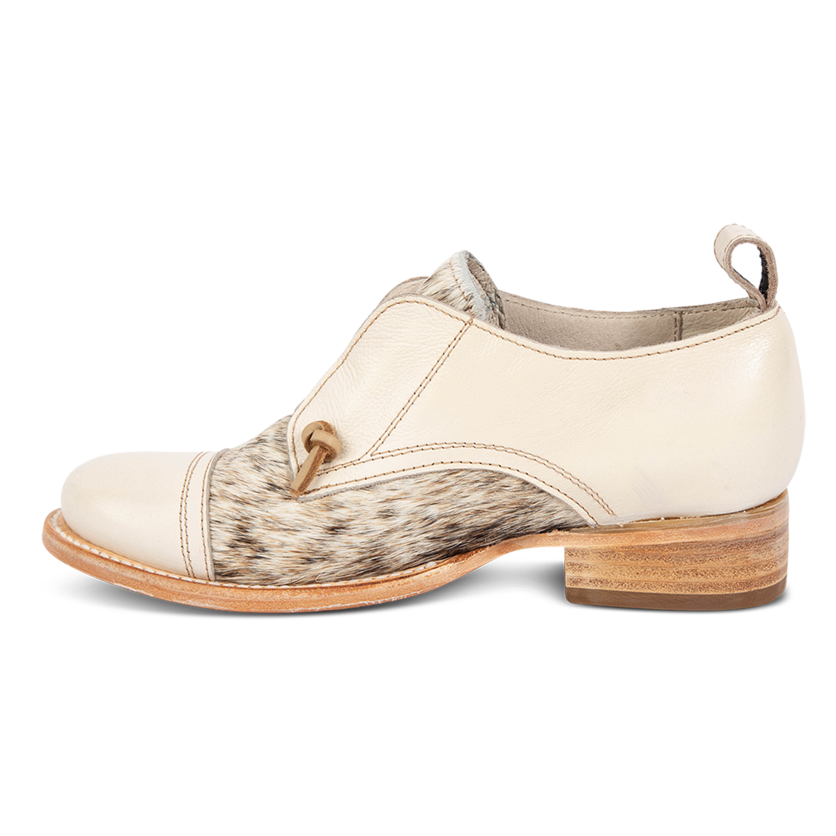 Inside view showing stitch detailing and low heel on FREEBIRD women's Mabel beige pony multi shoe