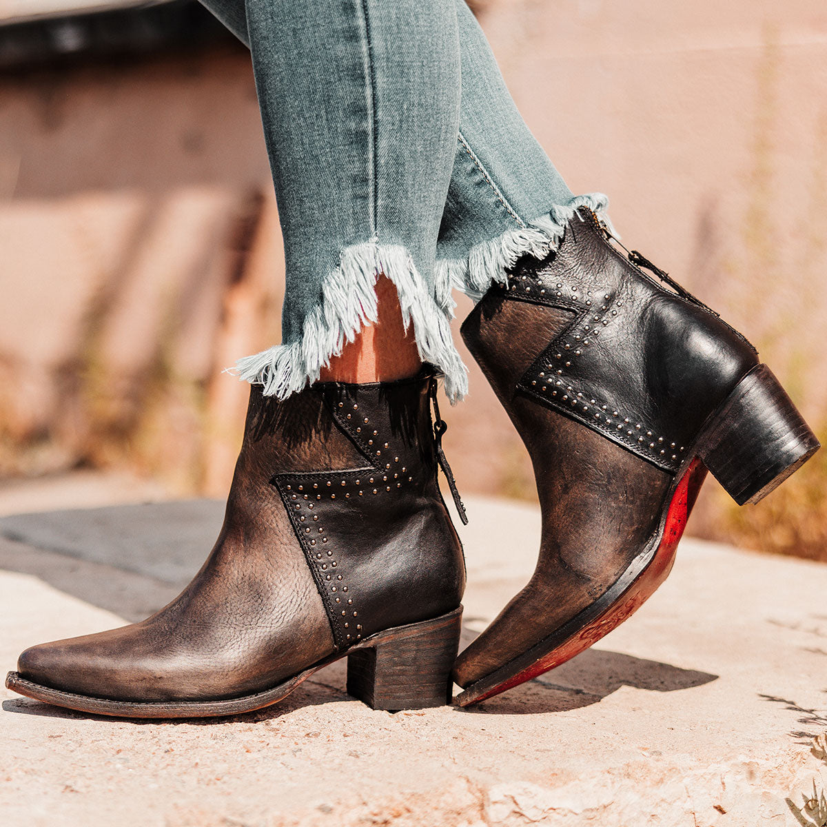 FREEBIRD women's Matilda black multi leather bootie with a two-tone shaft, stud embellishments and working back zipper