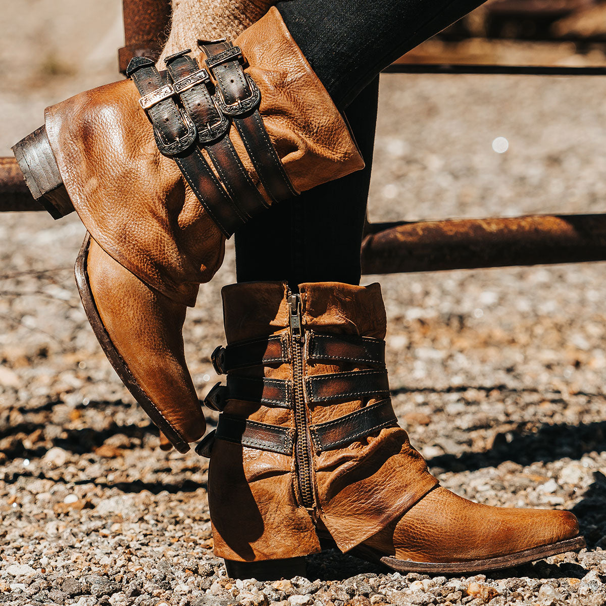 FREEBIRD women's Matteo tan leather bootie with a leather shaft overlay, adjustable shaft belts and snip toe construction