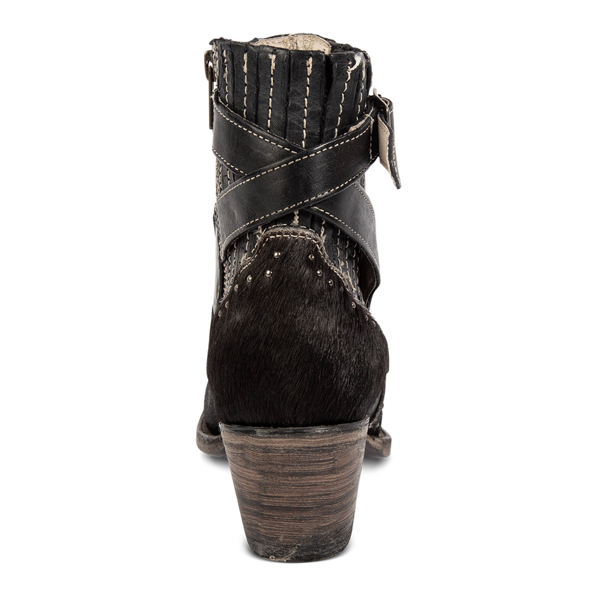 Back view showing wooden heel, gore detailing, and buckle straps on FREEBIRD women's Morgan black pony mutli leather ankle bootie