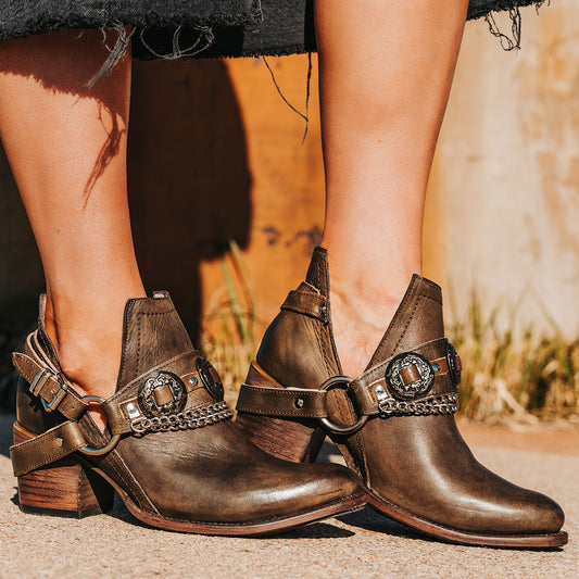 FREEBIRD women's Mystic brown leather belted embellished bootie with ankle framing cuts