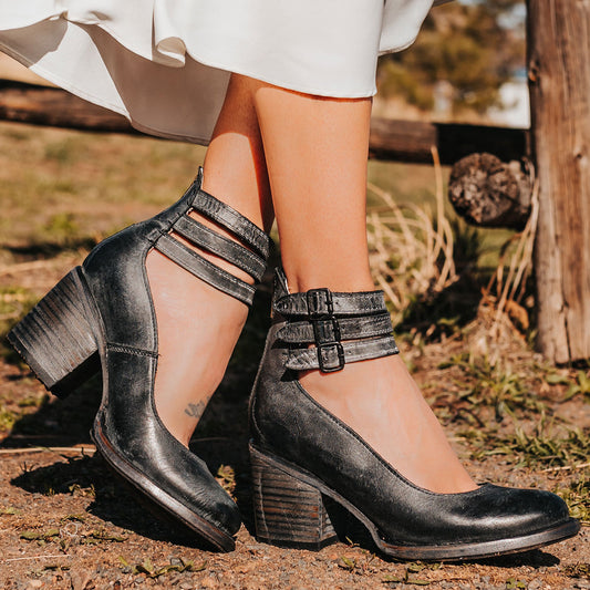 FREEBIRD women's Randi black leather open construction ankle strap heel with adjustable rustic buckles