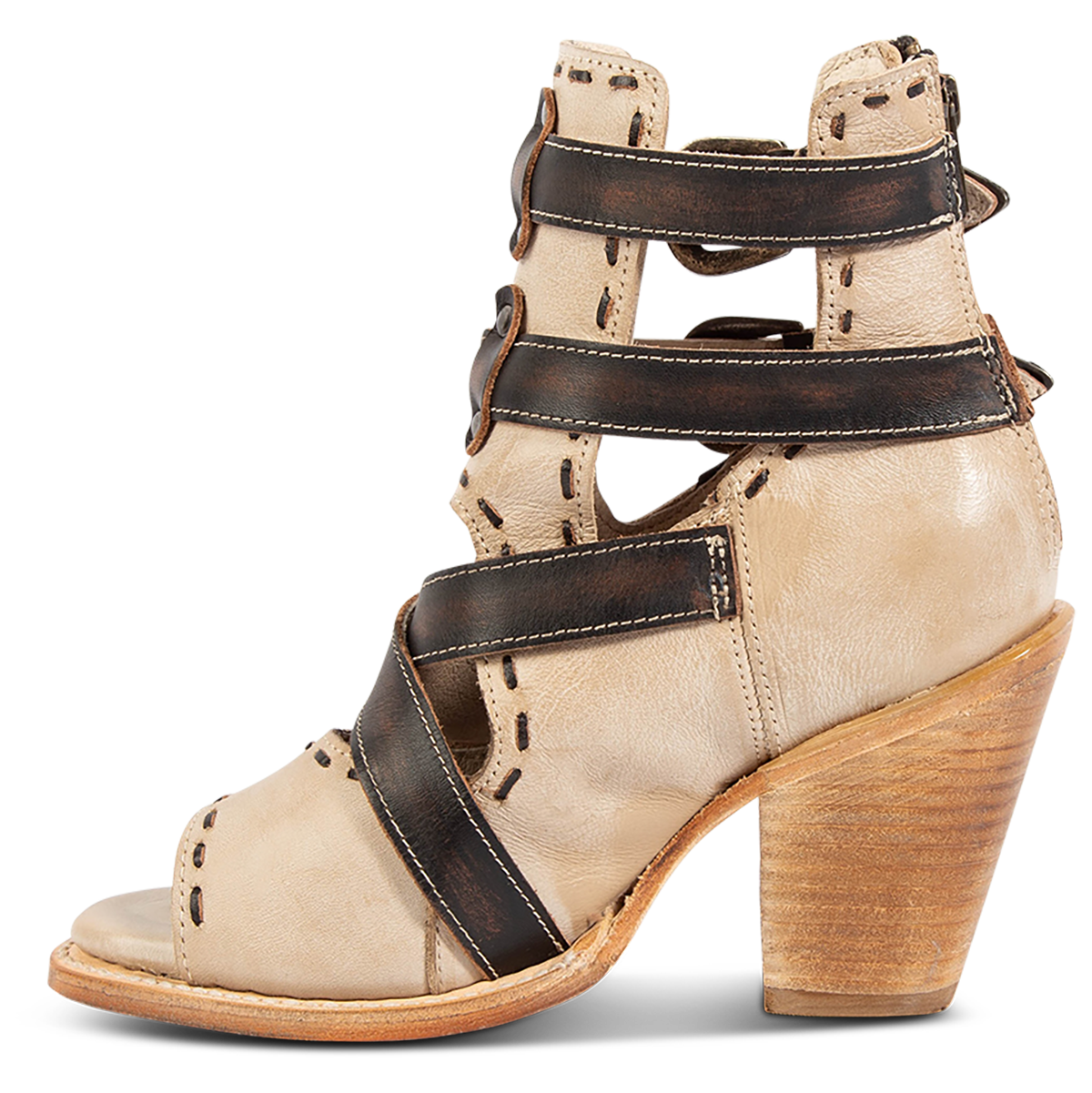 Inside view showing a stacked heel and contrasting leather straps on FREEBIRD women's Revenant beige leather sandal