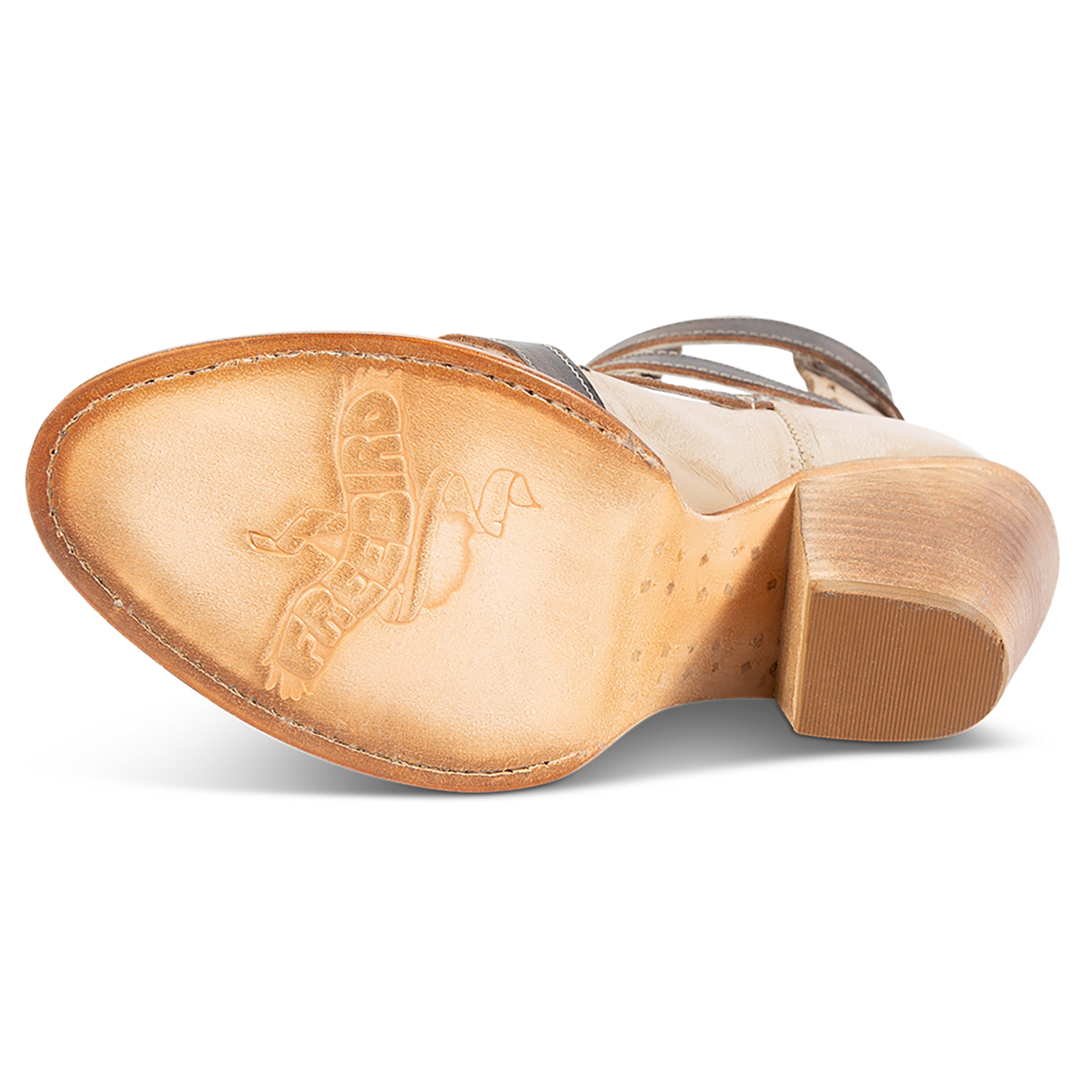 Leather sole imprinted with FREEBIRD on women's Revenant beige leather sandal 