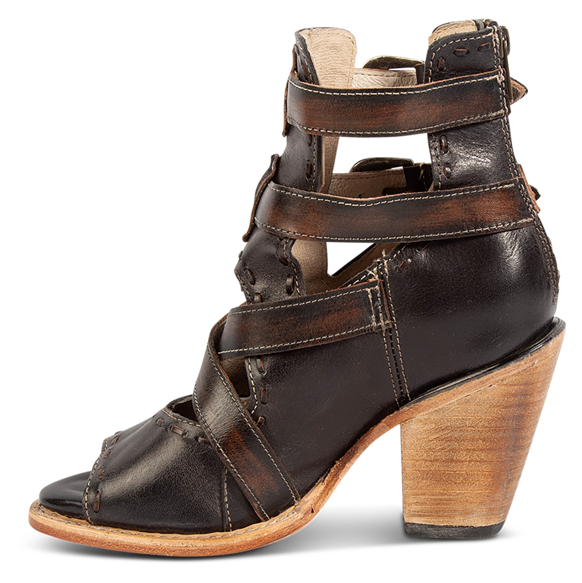 Inside view showing a stacked heel and contrasting leather straps on FREEBIRD women's Revenant black leather sandal