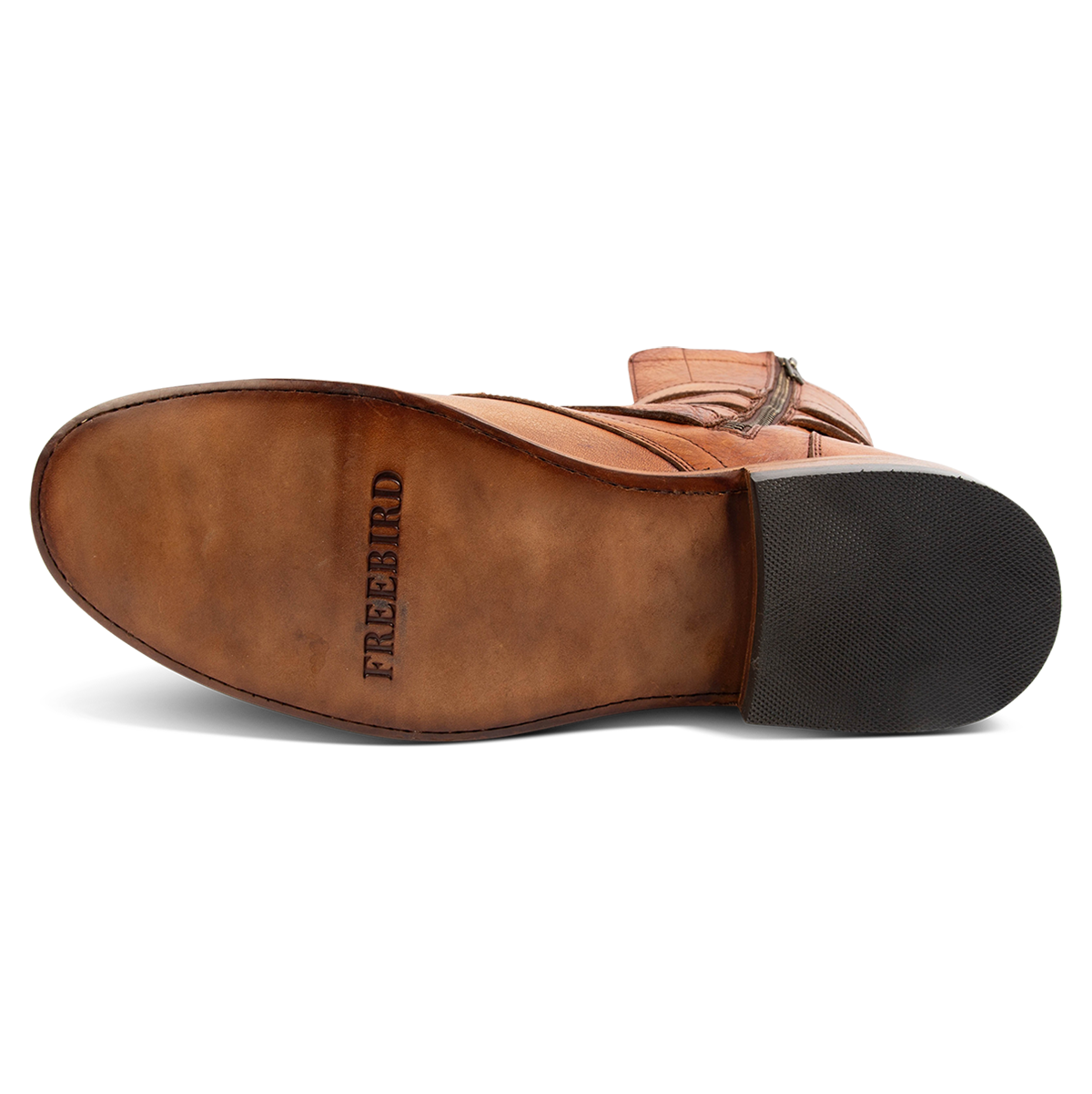 Leather sole imprinted with FREEBIRD on men's Rumble whiskey leather boot