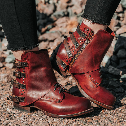 FREEBIRD women's Rynn red multi leather bootie with a protective leather overlay, front tie lacing and side snap closures