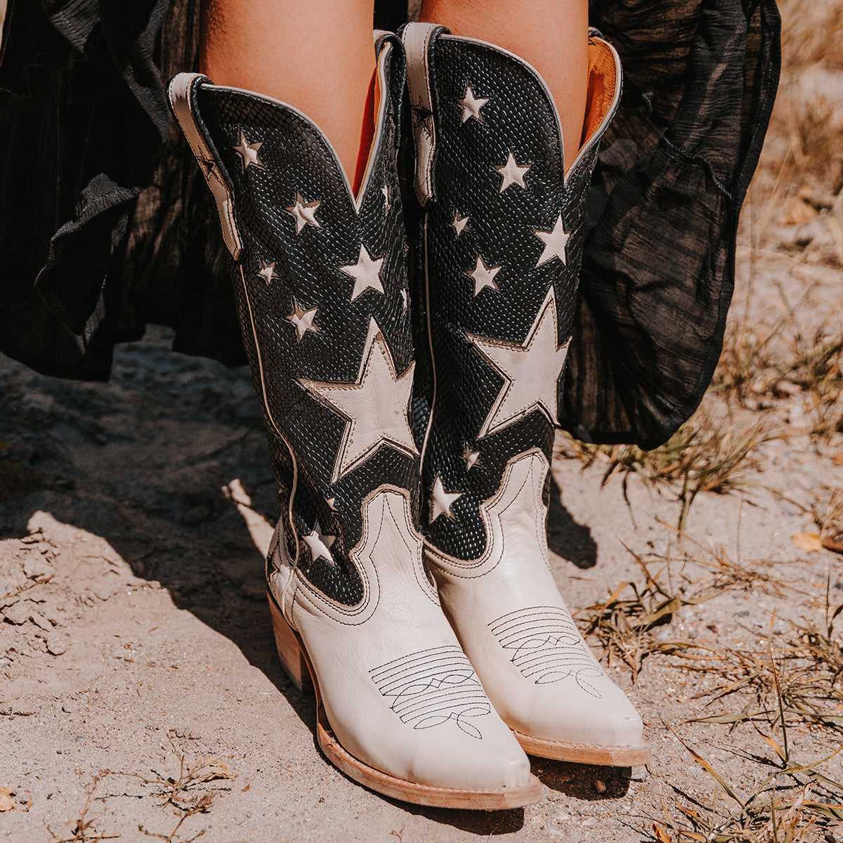 FREEBIRD women's Starzz black leather cowboy boot with two-toned leather star inlay detailing traditional stitching and snip toe construction