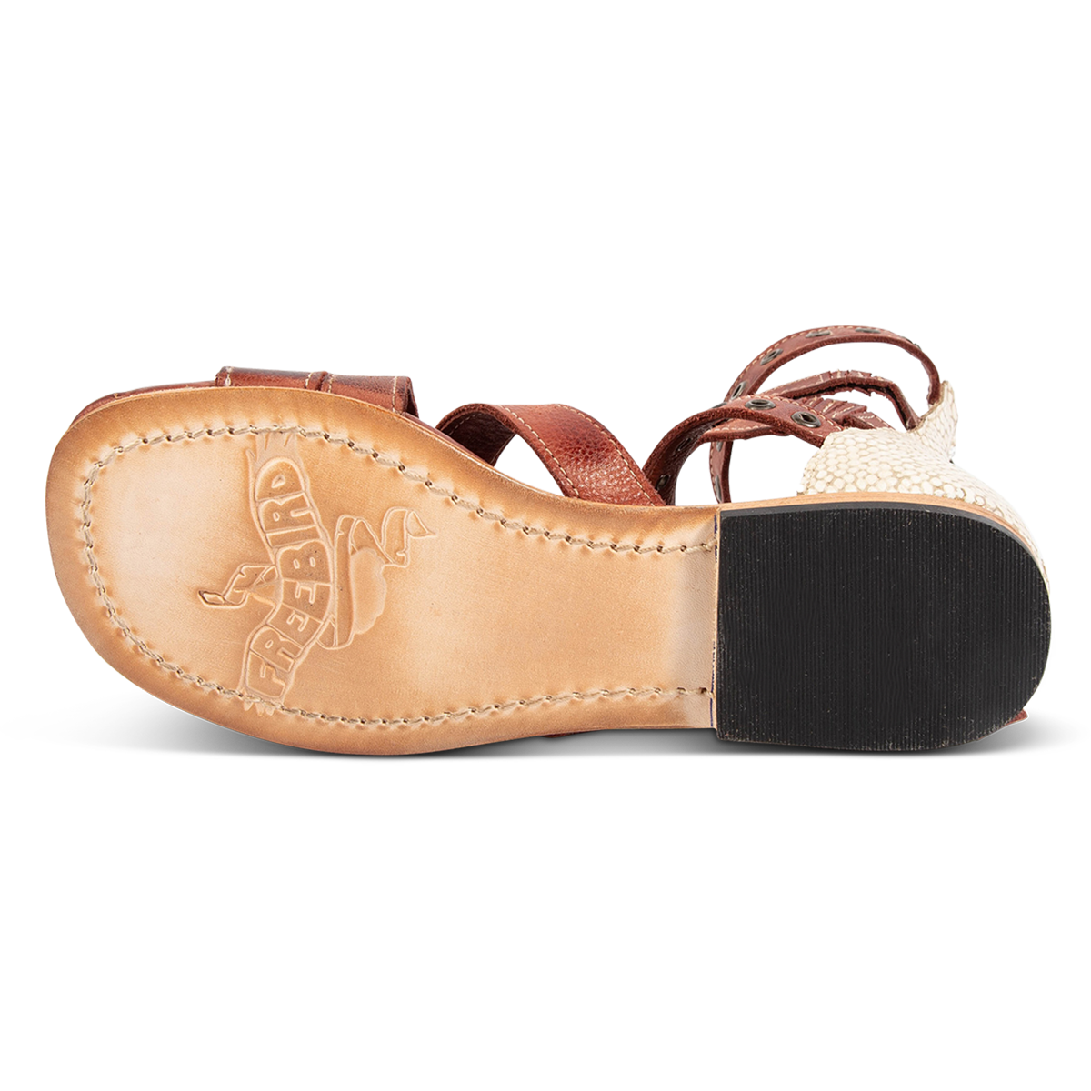 Leather sole imprinted with FREEBIRD on women's Sydney rust multi leather gladiator sandal