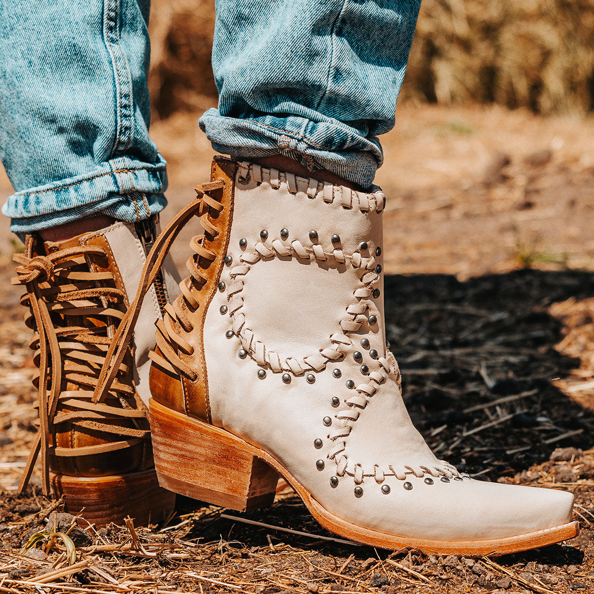 FREEBIRD women's Walker bone leather bootie with asymmetrical whip stitch detailing, stud embellishments and back heel lacing