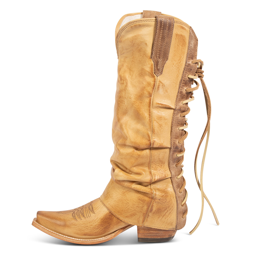 Inside view showing FREEBIRD women's Wilma beige leather boot with adjustable back tie lacing, relaxed leather shaft and traditional snip toe construction