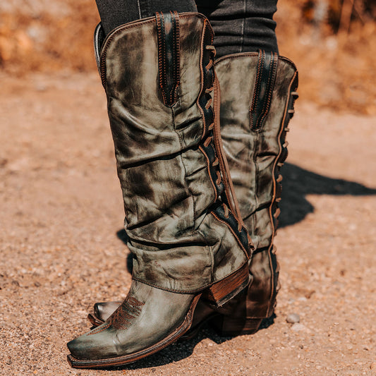 FREEBIRD women's Wilma olive leather boot with adjustable back tie lacing, relaxed leather shaft and traditional snip toe construction