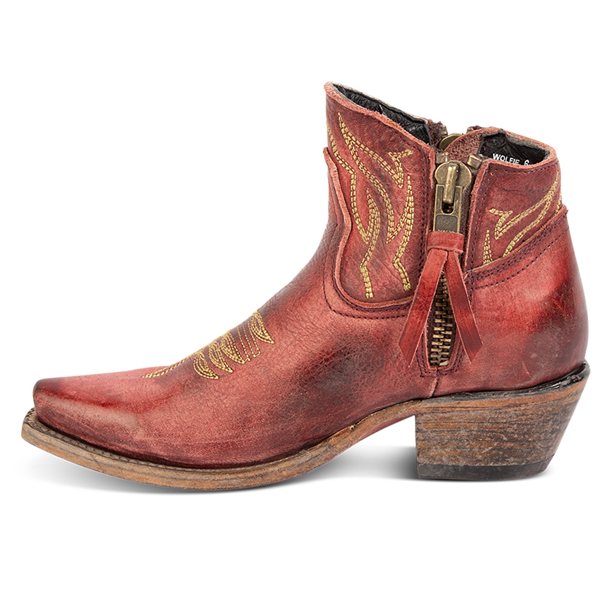 Side view of FREEBIRD women's Wolfie wine leather bootie with stitch detailing and snip toe construction