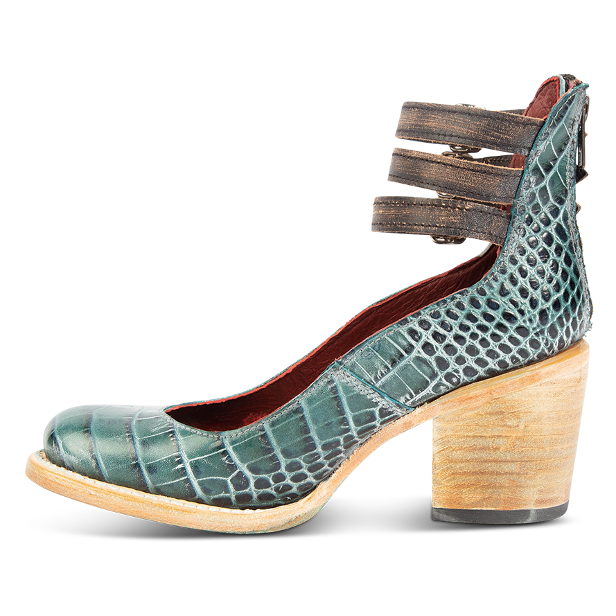 Inside view showing an open construction and wood heel with three adjustable ankle straps on FREEBIRD women’s Randi turquoise croco shoe