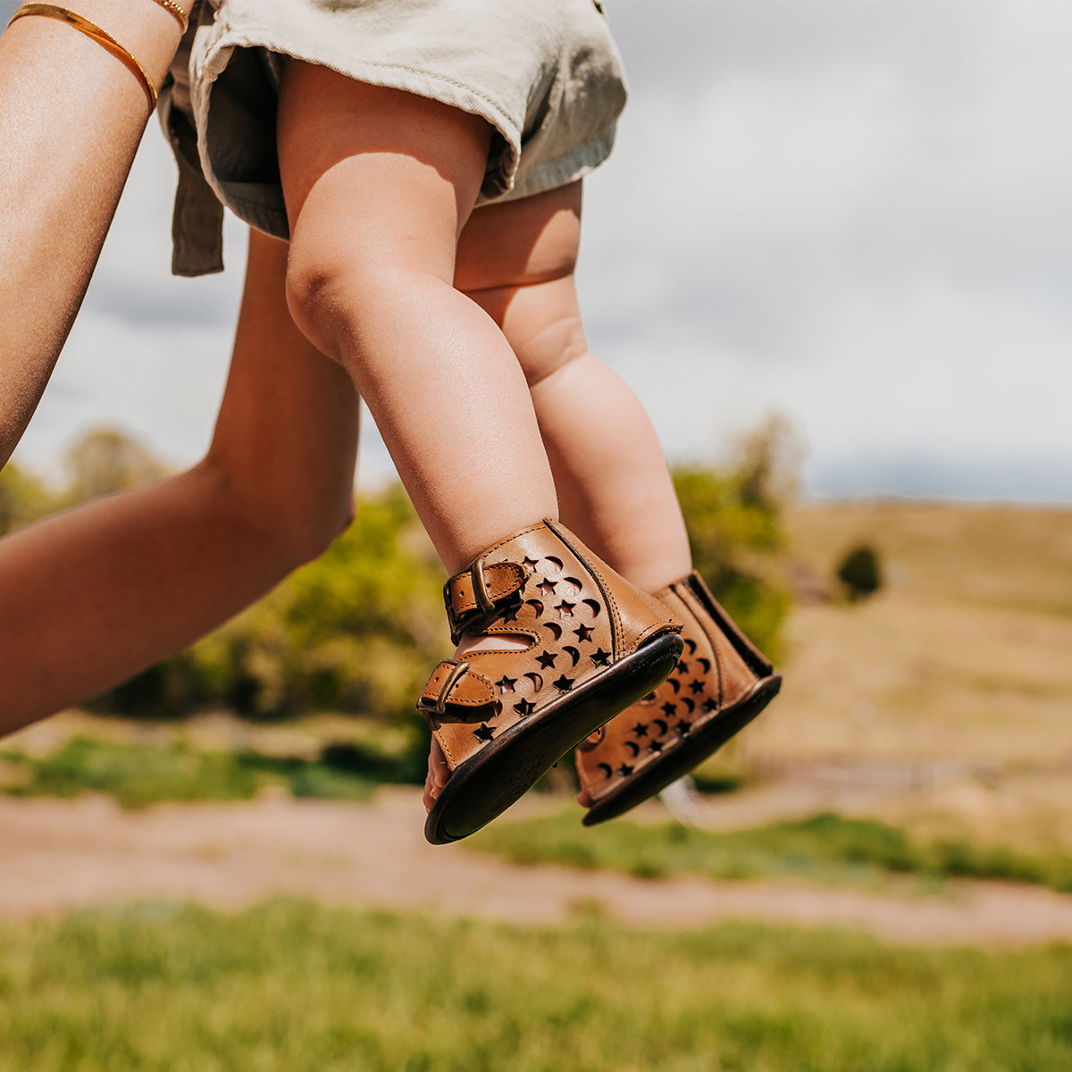 FREEBIRD infant baby teresa tan sandal with cutout leather detailing, embossed fashion straps, back velcro panel and soft sole